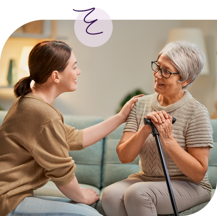 Caregiving - Elderly Mother and Daughter Laughing